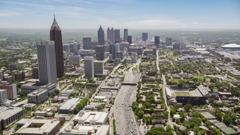 AX36_018.0000263F - Aerial stock photo of Downtown Connector and distant skyscrapers, Downtown Atlanta, Georgia
