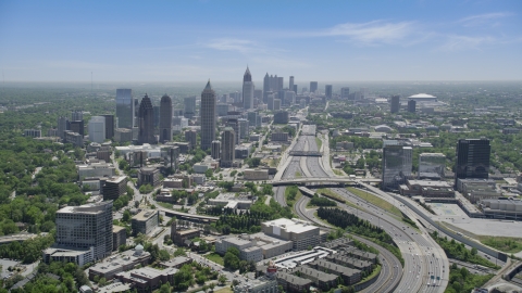 AX36_085.0000068F - Aerial stock photo of Downtown Connector near Midtown Atlanta skyscrapers, Georgia