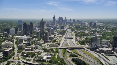 AX36_086.0000057F - Aerial stock photo of Downtown Connector near Midtown Atlanta skyscrapers, Georgia