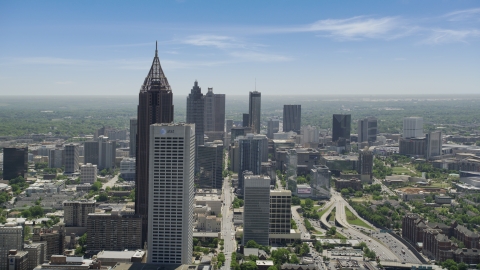 AX36_090.0000046F - Aerial stock photo of Bank of America Plaza and AT&T Building, hazy, Midtown Atlanta, Georgia