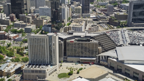 AX36_105.0000269F - Aerial stock photo of CNN Center and Omni Hotel, Downtown Atlanta, Georgia