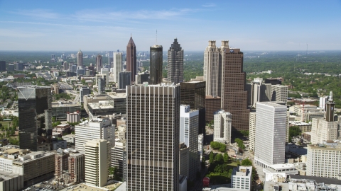 AX37_013.0000093F - Aerial stock photo of Downtown skyscrapers and office buildings under blue skies, Atlanta, Georgia