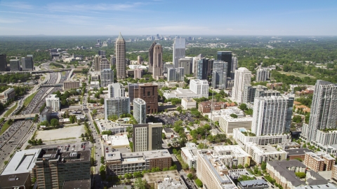 AX37_018.0000051F - Aerial stock photo of Midtown skyscrapers, hazy, Atlanta, Georgia