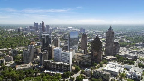 AX37_024.0000061F - Aerial stock photo of Midtown office buildings and skyscrapers, Atlanta, Georgia