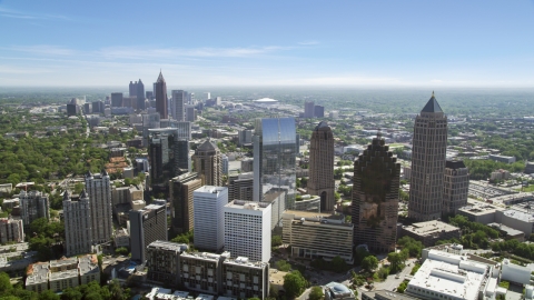 AX37_024.0000140F - Aerial stock photo of Midtown skyscrapers with Downtown in distance, Atlanta, Georgia