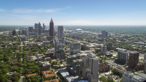 AX37_037.0000120F - Aerial stock photo of Midtown Atlanta skyscrapers with Downtown in the distance, Atlanta Georgia