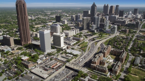 AX37_074.0000191F - Aerial stock photo of Heavy traffic on Downtown Connector, Midtown Atlanta, Georgia