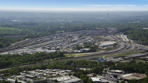 AX37_085.0000152F - Aerial stock photo of A train yard, hazy, Atlanta, Georgia