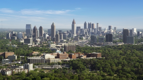 AX38_030.0000044F - Aerial stock photo of Midtown Atlanta skyline seen from Buckhead, Georgia
