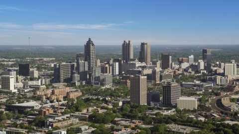 AX38_061.0000054F - Aerial stock photo of Sun Trust Plaza and skyscrapers in Downtown Atlanta, Georgia