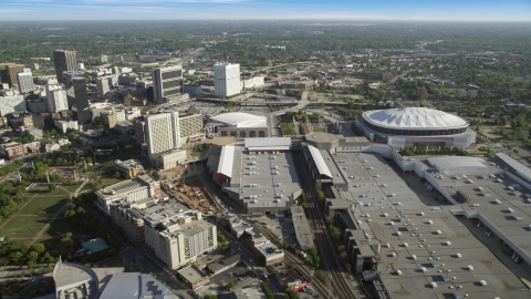 AX38_080.0000186F - Aerial stock photo of Georgia Dome and Georgia World Congress Center, Atlanta, Georgia