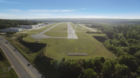AX38_085.0000132F - Aerial stock photo of Runway at Fulton County Airport, Atlanta, Georgia