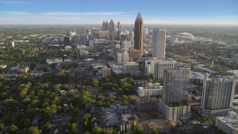 AX39_034.0000278F - Aerial stock photo of Bank of America Plaza and Downtown seen from Midtown Atlanta, Georgia