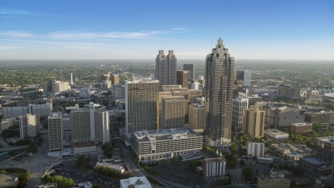 AX39_037.0000232F - Aerial stock photo of SunTrust Plaza and Atlanta Marriott Marquis among neighboring high-rises, Downtown Atlanta