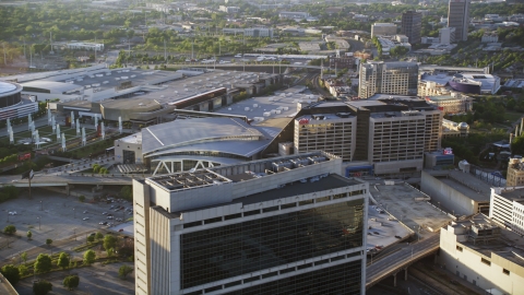 AX39_046.0000046F - Aerial stock photo of CNN Center and Philips Arena, Downtown Atlanta, Georgia