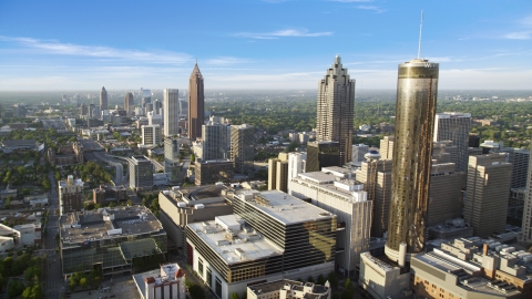 AX39_047.0000126F - Aerial stock photo of Westin Peachtree Plaza Hotel and SunTrust Plaza among high-rises, Downtown Atlanta