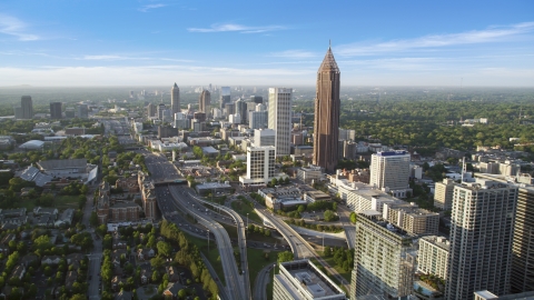 AX39_048.0000268F - Aerial stock photo of Midtown Atlanta buildings toward Bank of America Plaza, Georgia