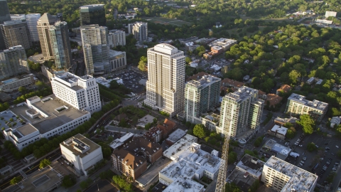 AX39_052.0000044F - Aerial stock photo of 999 Peachtree Street and condominium complex, Midtown Atlanta, Georgia