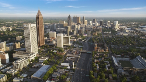 AX39_063.0000000F - Aerial stock photo of Downtown Connector toward Downtown skyscrapers, Atlanta, Georgia