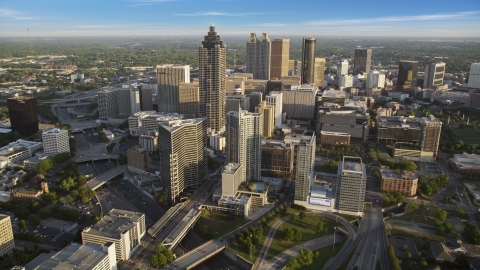 AX39_064.0000211F - Aerial stock photo of SunTrust Plaza and Downtown Atlanta skyscrapers, Georgia, haze