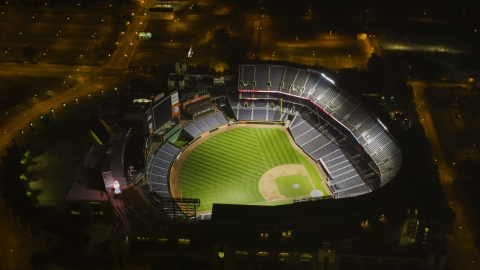 AX41_004.0000209F - Aerial stock photo of Turner Field baseball stadium with empty stands and field, Atlanta, Georgia, night