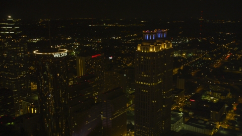 AX41_011.0000224F - Aerial stock photo of Tops of skyscrapers in Downtown Atlanta, Georgia, night