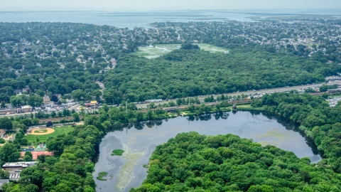 AXP071_000_0010F - Aerial stock photo of Lakes in the Massapequa Preserve, Massapequa Park, Long Island, New York