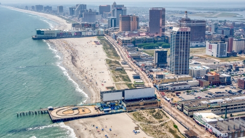 AXP071_000_0021F - Aerial stock photo of Central Pier, Playground Pier and hotels in Atlantic City, New Jersey