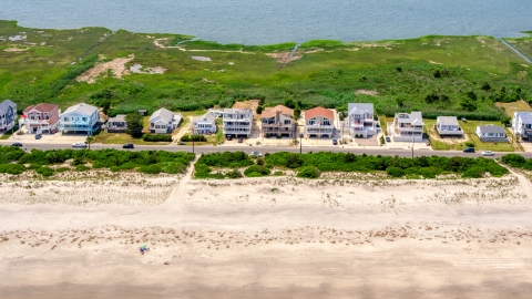 AXP071_000_0026F - Aerial stock photo of Beachfront homes in Strathmere, New Jersey