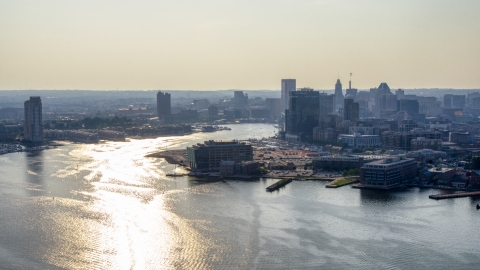AXP073_000_0009F - Aerial stock photo of The Patapsco River and Downtown Baltimore skyline, Maryland