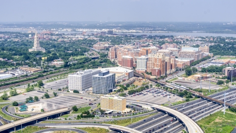 AXP075_000_0001F - Aerial stock photo of Office buildings near the George Washington Masonic National Memorial in Alexandria, Virginia