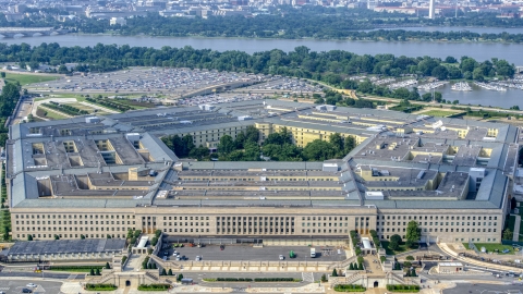 AXP075_000_0022F - Aerial stock photo of The Pentagon in Washington DC with Potomac River in the background
