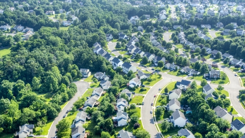 AXP075_000_0026F - Aerial stock photo of A suburban neighborhood in Manassas, Virginia