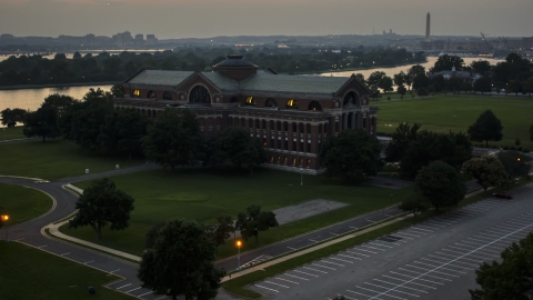 AXP076_000_0033F - Aerial stock photo of Roosevelt Hall at the National War College, Washington, D.C., twilight