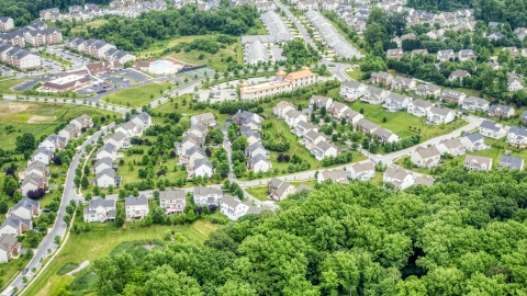 AXP078_000_0003F - Aerial stock photo of Tract homes in Ellicott City, Maryland