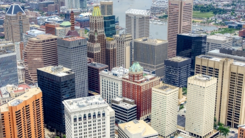 AXP078_000_0006F - Aerial stock photo of Skyscrapers and city buildings in Downtown Baltimore, Maryland