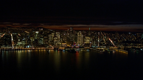 DCSF06_003.0000210 - Aerial stock photo of Downtown San Francisco skyscrapers seen from San Francisco Bay, California, night