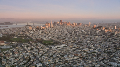 DCSF07_055.0000215 - Aerial stock photo of Marina District with Downtown San Francisco in the background, California, sunset