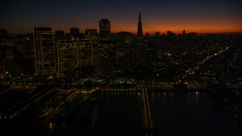 DCSF07_113.0000251 - Aerial stock photo of Downtown San Francisco skyscrapers and Transamerica Pyramid, California, twilight