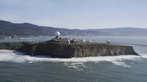 DFKSF15_068.0000271 - Aerial stock photo of The Pillar Point Air Force Station beside the ocean in Half Moon Bay, California