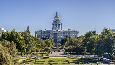 DXP001_000152 - Aerial stock photo of Colorado State Capitol seen from park lined with trees in Downtown Denver, Colorado