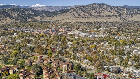 DXP001_000206 - Aerial stock photo of The small town near mountain ridges, Boulder, Colorado