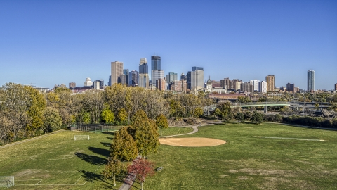 DXP001_000304 - Aerial stock photo of The city skyline's skyscrapers seen from a park, Downtown Minneapolis, Minnesota