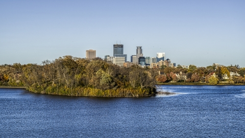 DXP001_000316 - Aerial stock photo of The city skyline's skyscrapers seen from Lake of the Isles, Downtown Minneapolis, Minnesota