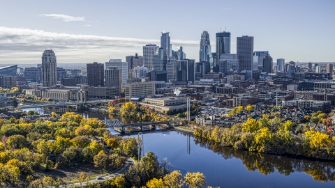 DXP001_000370 - Aerial stock photo of Bridges spanning the Mississippi River, and city skyline in distance, Downtown Minneapolis, Minnesota