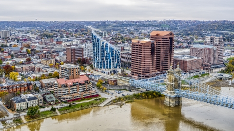 DXP001_000478 - Aerial stock photo of Condo complex and riverfront office buildings by the Roebling Bridge, Covington, Kentucky
