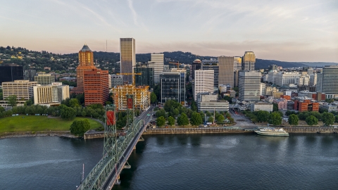 DXP001_010_0003 - Aerial stock photo of City skyline and Hawthorne Bridge spanning the Willamette River, Downtown Portland, Oregon
