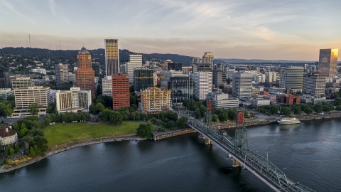DXP001_010_0004 - Aerial stock photo of City skyline and Hawthorne Bridge over the Willamette River, Downtown Portland, Oregon