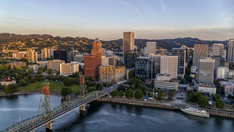 DXP001_010_0007 - Aerial stock photo of Tall skyscrapers and the Hawthorne Bridge spanning the Willamette River, Downtown Portland, Oregon