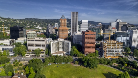 DXP001_011_0013 - Aerial stock photo of Marriott hotel flanked by taller office buildings and towering skyscrapers in Downtown Portland, Oregon